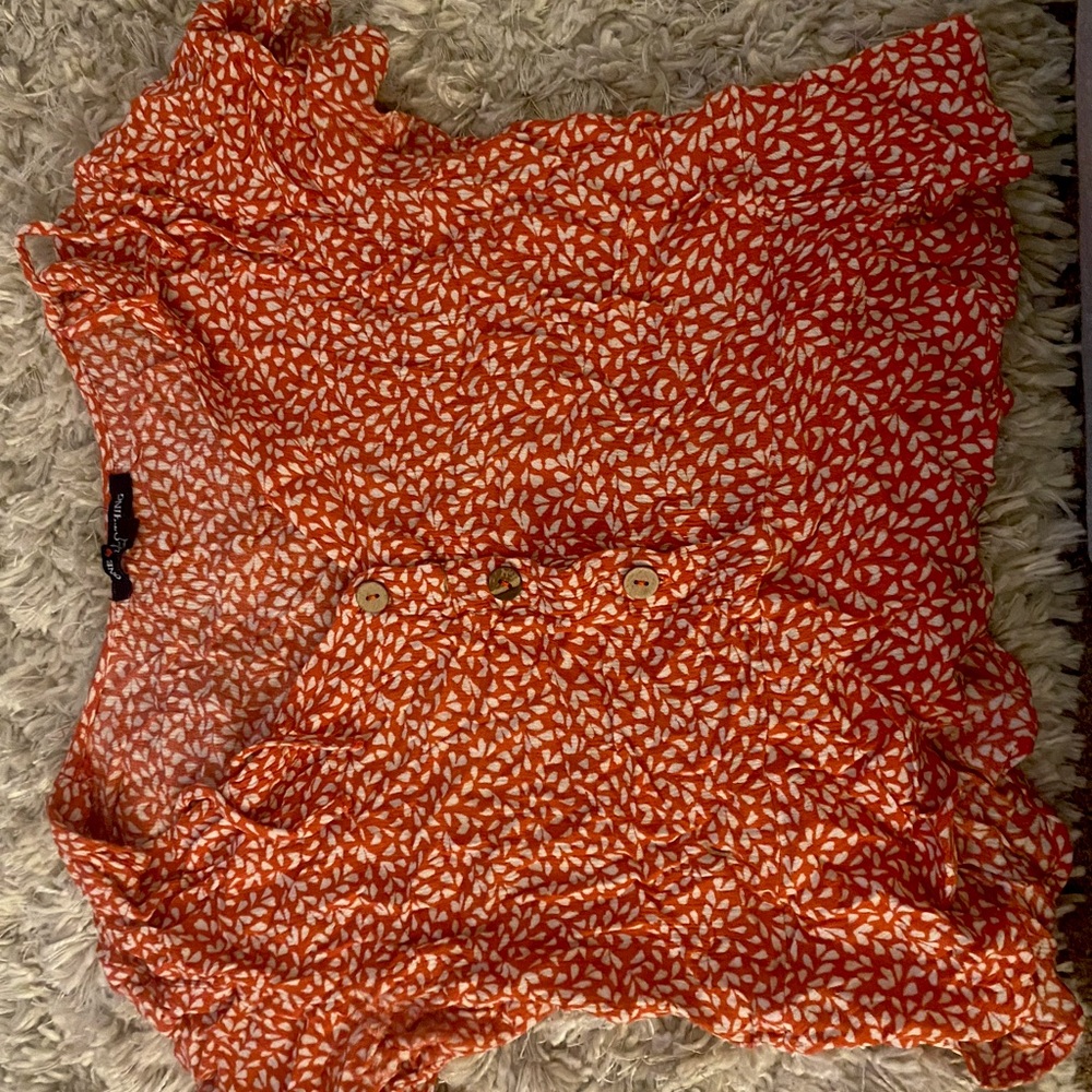 Red and white slight peplum top